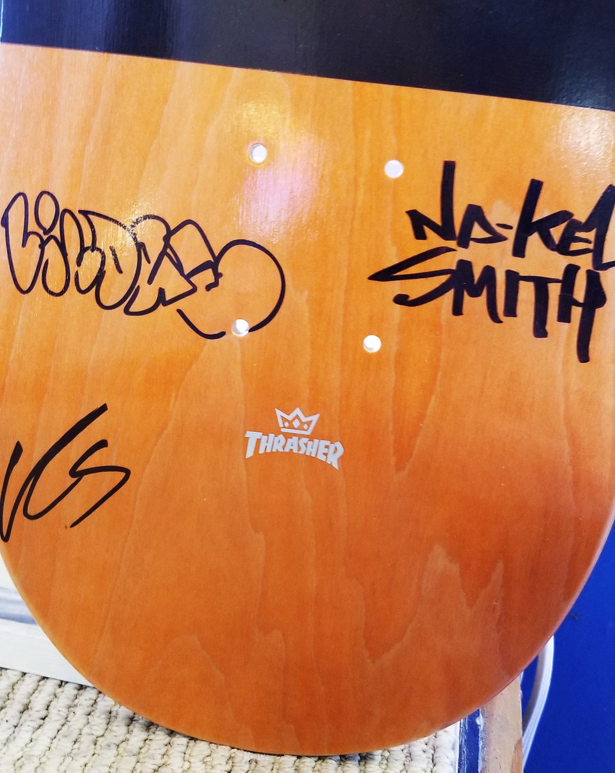 Signed limited edition Thrasher skateboard deck 8.5in.